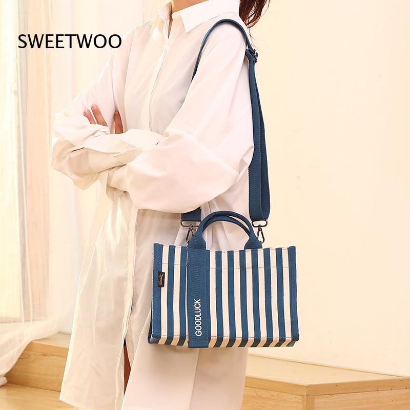 2026 Vertikal gestreifte Canva – Women Hand Bags For Office Bewertung und Preis