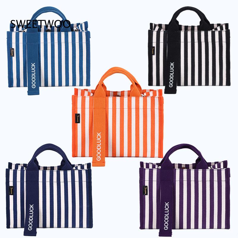 2026 Vertikal gestreifte Canva – Women Hand Bags For Office Bewertung und Preis